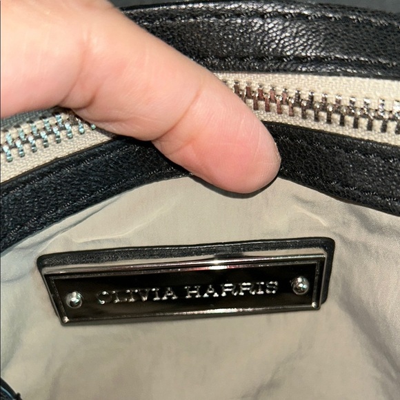 Olivia Harris Black Leather Duffel Bag with Modern Chain-Link Design - Picture 13 of 16